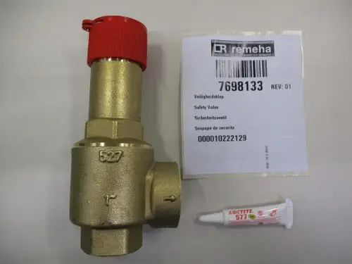 Sicherheitsventil der Marke Remeha mit rotem Schutzkappenverschluss und daneben befindlicher Loctite-Dichtmasse auf einem neutralen Untergrund.